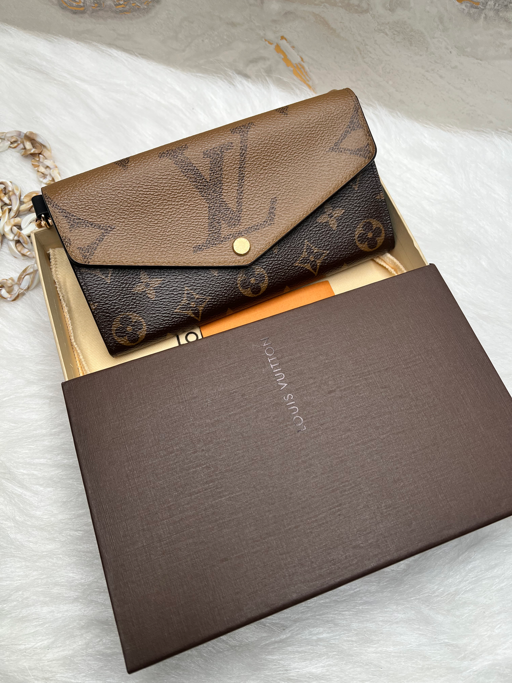 LV reverse mono wallet image 0